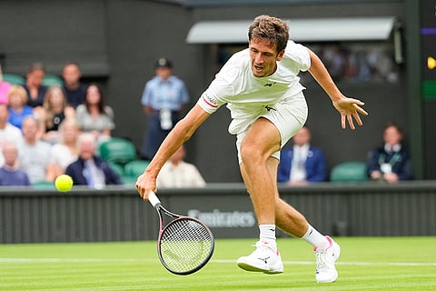 Vit Kopriva return the ball to Djokovic